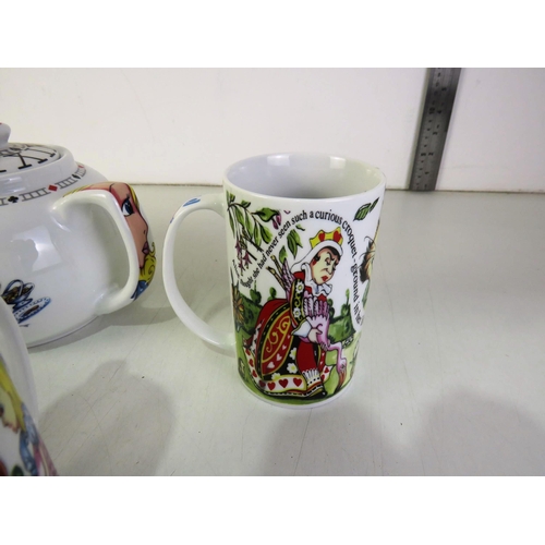 224 - Collectable alice in wonderland tea set