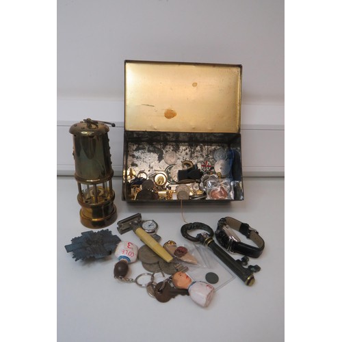 41 - Old tin of miscellaneous items including 7inch miners lamp, coins, badges etc