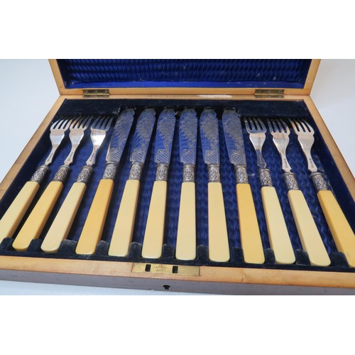 230 - Boxed silver band cutlery set