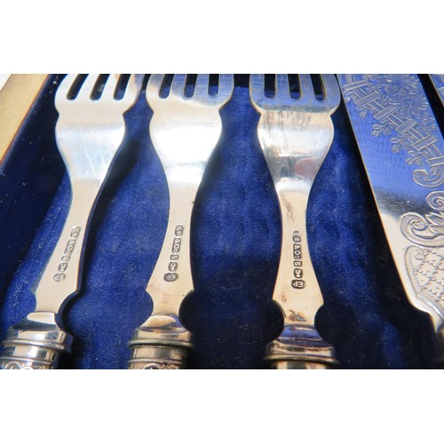 230 - Boxed silver band cutlery set