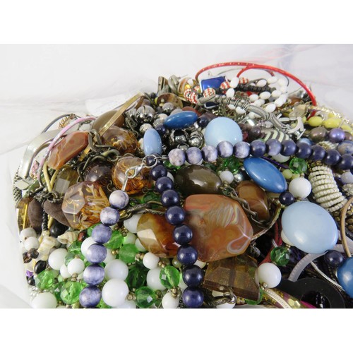 298 - 10kg bag of unsorted costume jewellery.