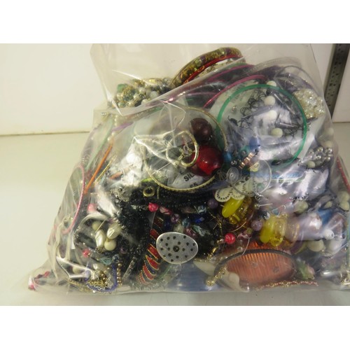 298 - 10kg bag of unsorted costume jewellery.