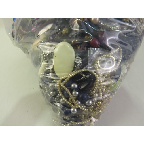 299 - 10kg bag of unsorted costume jewellery.