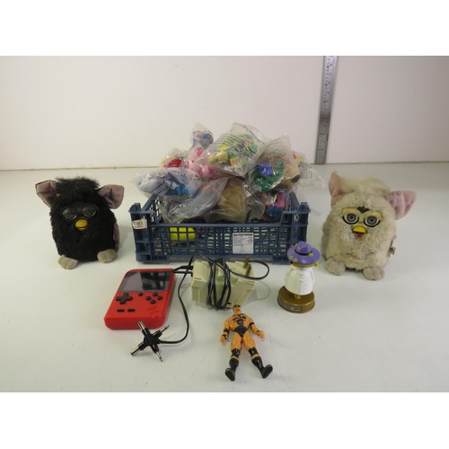 279 - Vintage toys including Furbies and unopened McDonalds toys.