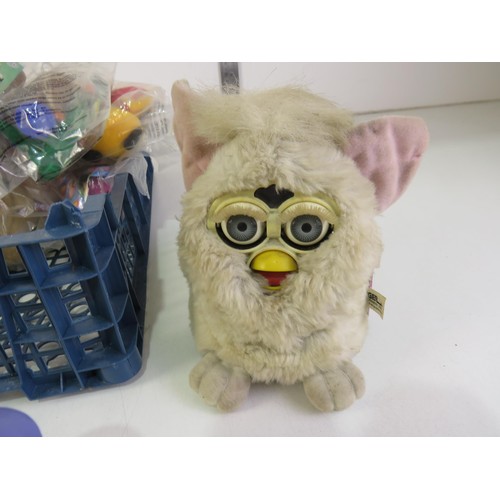 279 - Vintage toys including Furbies and unopened McDonalds toys.