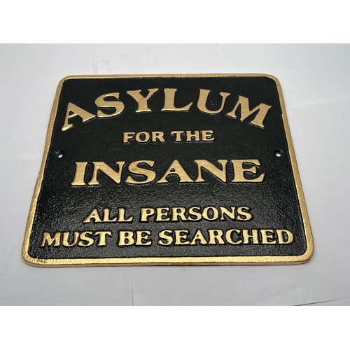 190 - Cast 'Asylum for the Insane' sign.