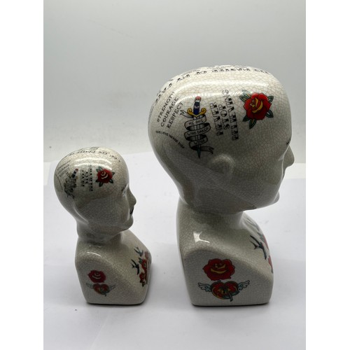 191 - Two phrenology heads.