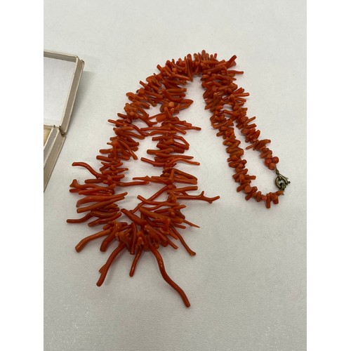 27 - Vintage carved coral lobster brooch and coral branch necklace.