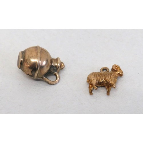 8 - Two 9ct Gold charms, Ram and Jug
Weight 2.4g.