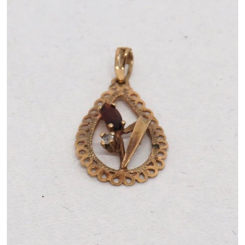 24 - Vintage 9ct Gold Garnet and CZ pendant.
Weight 0.6g