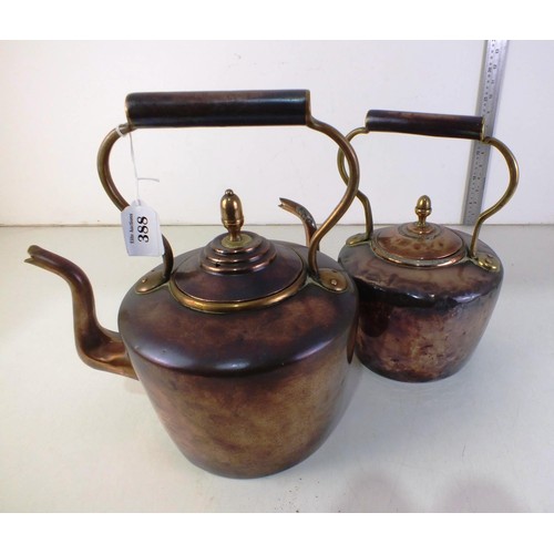 388 - Two large copper kettles