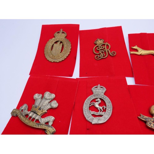 2 - 18 Military Infantry Cap badges to inc 
Berkshire 
Northumberland
Queens own Oxfordhire hussars
Quee... 