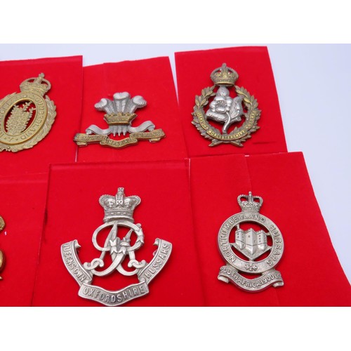 2 - 18 Military Infantry Cap badges to inc 
Berkshire 
Northumberland
Queens own Oxfordhire hussars
Quee... 