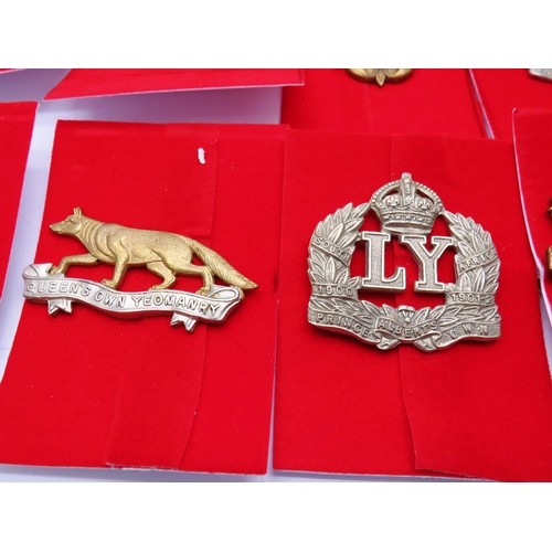 2 - 18 Military Infantry Cap badges to inc 
Berkshire 
Northumberland
Queens own Oxfordhire hussars
Quee... 