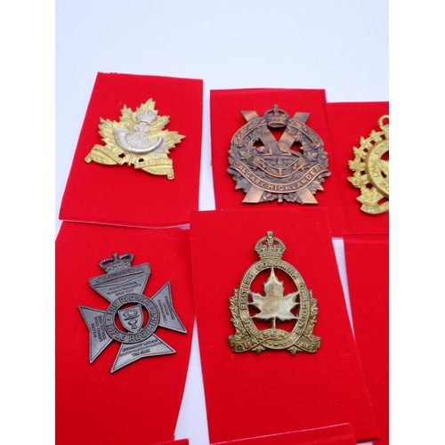 3 - 18 Canadian Military Cap badges to inc 
Hussars
De Hull
Calgary Highlanders
West Nova Scotia