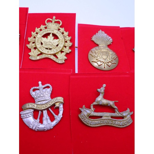 3 - 18 Canadian Military Cap badges to inc 
Hussars
De Hull
Calgary Highlanders
West Nova Scotia