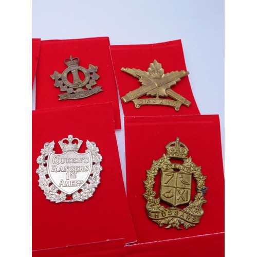 3 - 18 Canadian Military Cap badges to inc 
Hussars
De Hull
Calgary Highlanders
West Nova Scotia