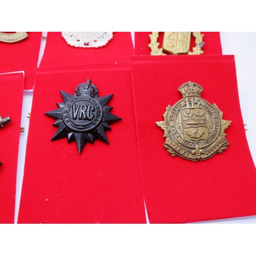 3 - 18 Canadian Military Cap badges to inc 
Hussars
De Hull
Calgary Highlanders
West Nova Scotia