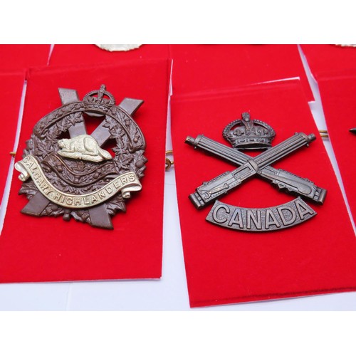 3 - 18 Canadian Military Cap badges to inc 
Hussars
De Hull
Calgary Highlanders
West Nova Scotia