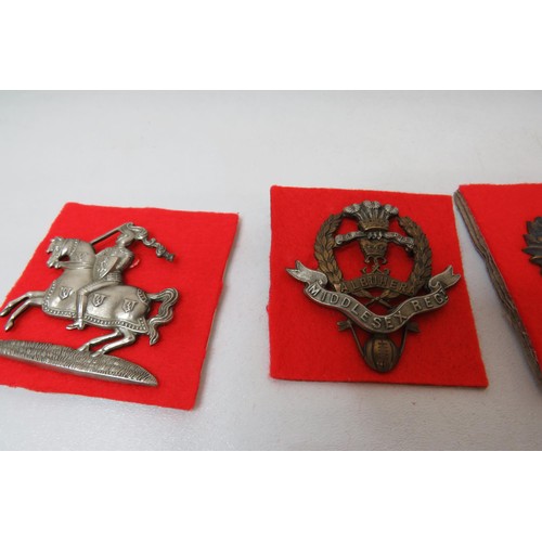 6 - 18 Military Infantry Cap badges to inc 
British Asian
Middlesex
PW Yorkshire