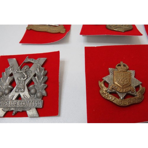 7 - 18 Military Infantry Cap badges to inc 
Royal Frontiersmen
Pro Reg ET LEGE
Tank Corps