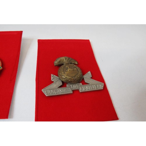 8 - 18 Military Infantry Cap badges to inc 
Lincolnshire 
The Kings Own
Manu Forti