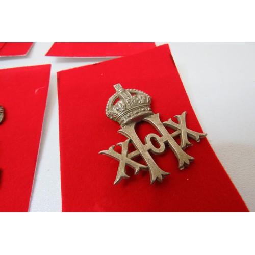 23 - 18 Military Infantry  badges to inc 
Devonshire
Suffolk 
Royal irish