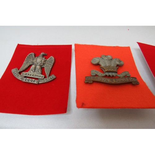 28 - 18 Military Cavalry  badges to inc 
Waterloo Royal Scots Greys 
Royal Lancers 
Royal Hussars