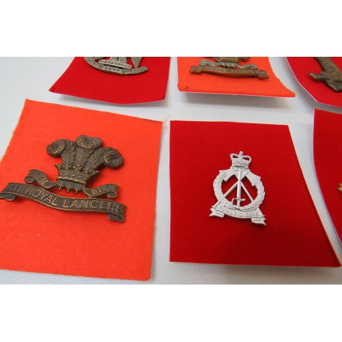 28 - 18 Military Cavalry  badges to inc 
Waterloo Royal Scots Greys 
Royal Lancers 
Royal Hussars