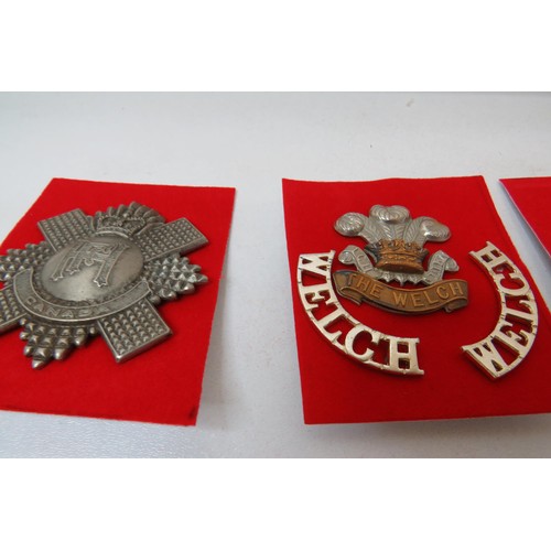 42 - 18 No  military badges inc 
The Royal Regiment of Canada 
The Welch 
Loyal North Lancashire