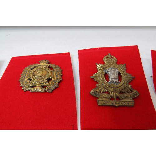 42 - 18 No  military badges inc 
The Royal Regiment of Canada 
The Welch 
Loyal North Lancashire