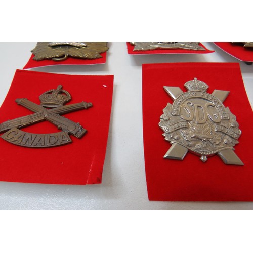 42 - 18 No  military badges inc 
The Royal Regiment of Canada 
The Welch 
Loyal North Lancashire