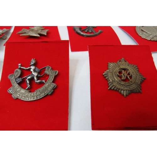 42 - 18 No  military badges inc 
The Royal Regiment of Canada 
The Welch 
Loyal North Lancashire