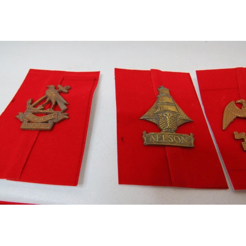 72 - 18 Military Cap/Regimental badges