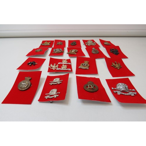 73 - 18 Military Cap/Regimental badges