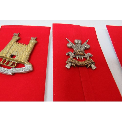 73 - 18 Military Cap/Regimental badges