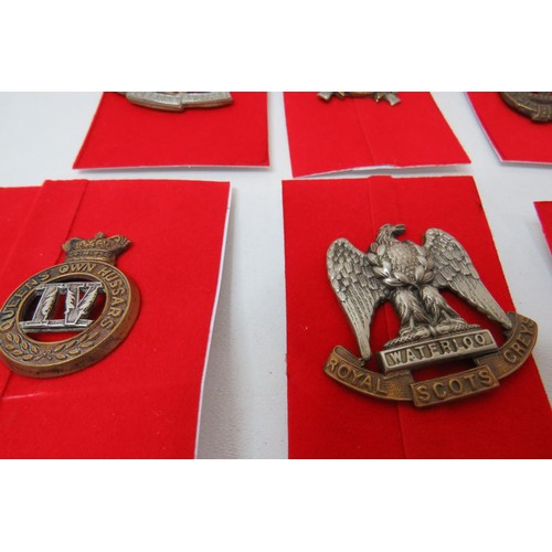 73 - 18 Military Cap/Regimental badges