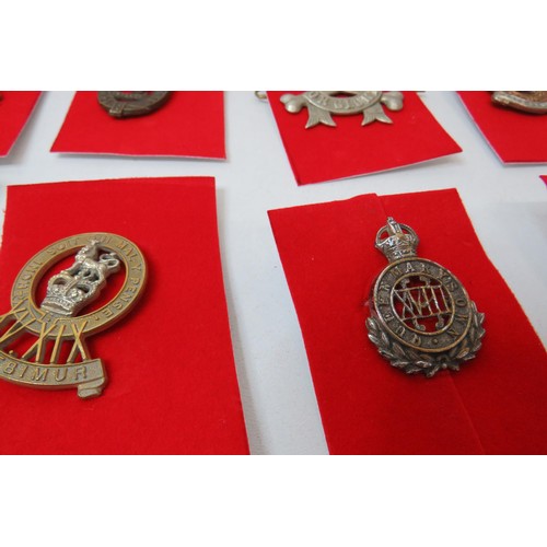 73 - 18 Military Cap/Regimental badges