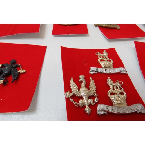 73 - 18 Military Cap/Regimental badges