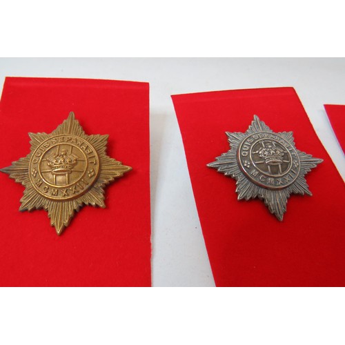 74 - 18 Military Cap/Regimental badges