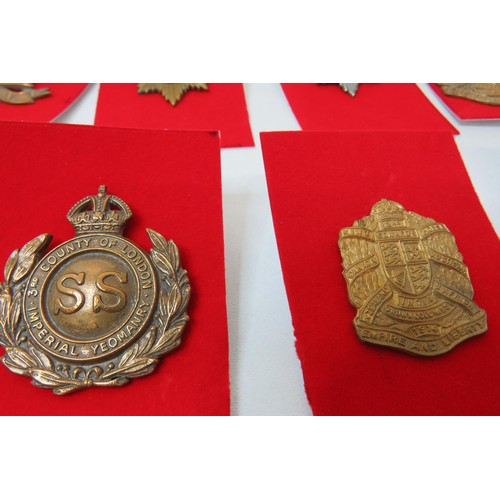 74 - 18 Military Cap/Regimental badges