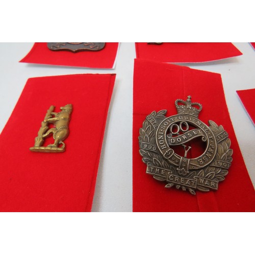 76 - 18 Military Cap/Regimental badges