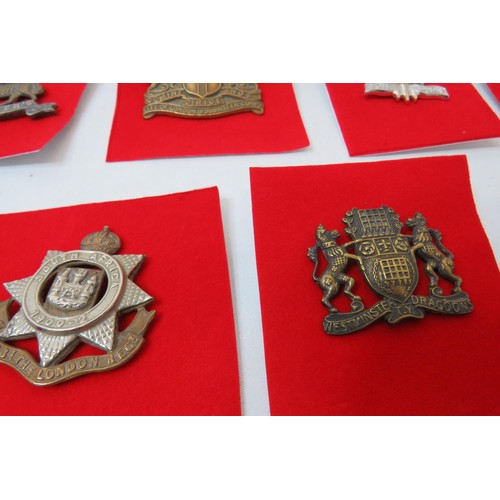 76 - 18 Military Cap/Regimental badges