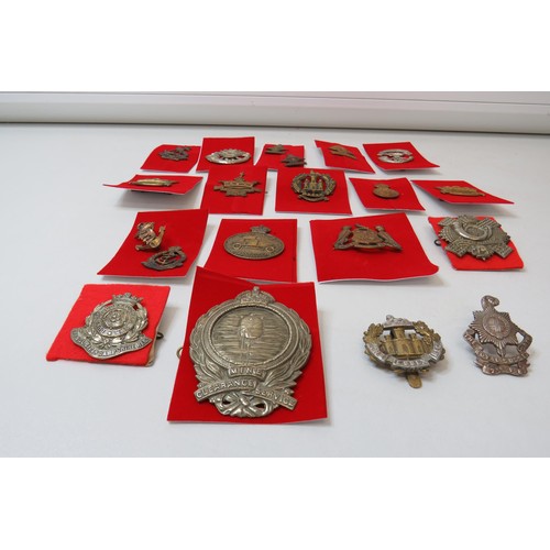 77 - 18 Military Cap/Regimental badges