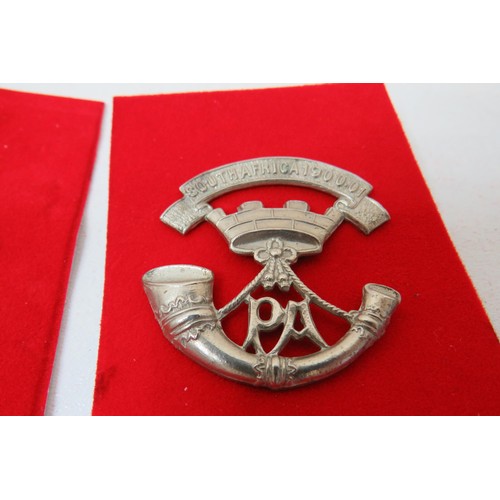 77 - 18 Military Cap/Regimental badges