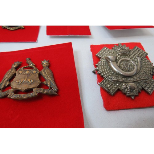 77 - 18 Military Cap/Regimental badges