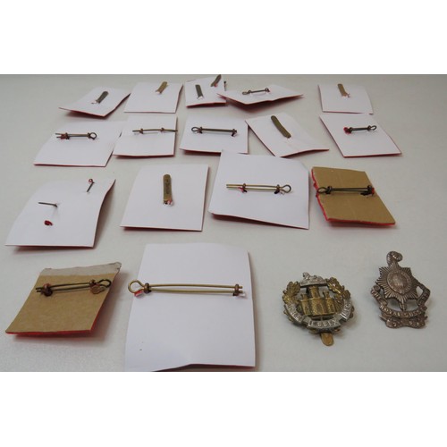 77 - 18 Military Cap/Regimental badges