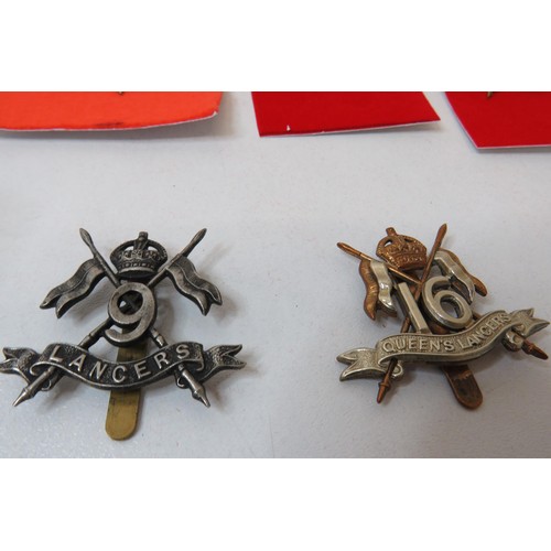 79 - 18 Military Cap/Regimental badges