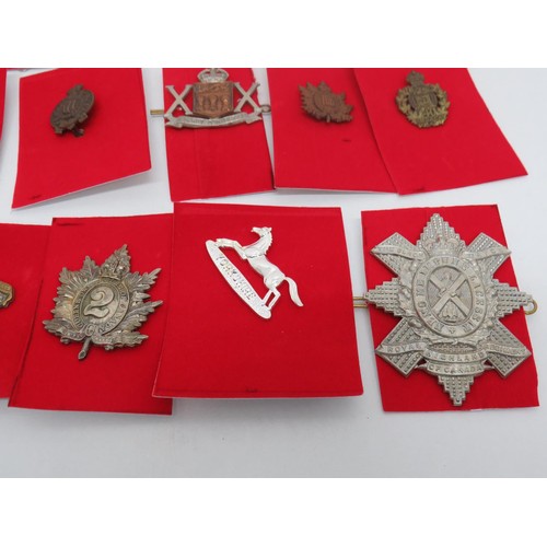 48 - 18 Military Regiment/Cap Badges to Inc 
140 Canada
Queens own Oxfordshire Hussars 
Royal Highland of... 