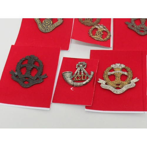 51 - 18 Military Regiment/Cap Badges to Inc 
Loyal north Lancashire
48 Highlanders 
Middlesex